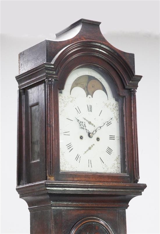 An early 19th century oak eight day longcase clock, 7ft 1in.